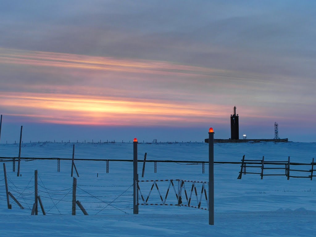 Military base gates, calibration mast in distance, Norilsk Vega MS